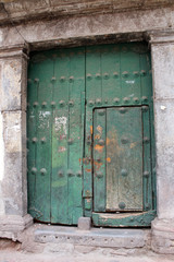 Old green wooden door