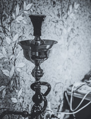 Naklejka premium Big hookah for tobacco made of metal, glass and ceramics