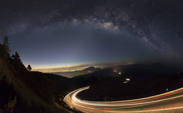 milky way and light from the road