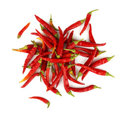 Heap of red hot chili peppers isolated on white