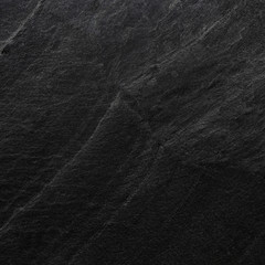 Dark grey black slate background or texture.