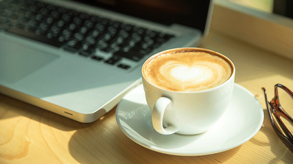 Hot Cappuccino in white cup.