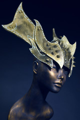 Mannequin in armour head wear with spikes