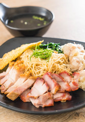 Egg noodle with red roast pork, crispy pork, dumplings and soup