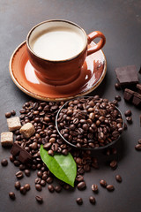Coffee cup, beans, chocolate