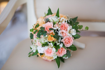 gentle wedding bouquet of fresh flowers of roses