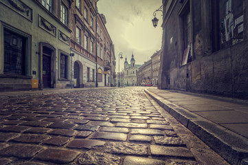 Cobbled street of the old town - obrazy, fototapety, plakaty
