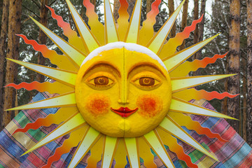 Decorative sculpture colorful sun