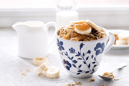 Healthy breakfast Muesli with milkhoney and banana