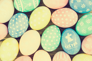 Easter eggs on wooden background, Vintage color style