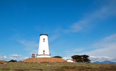 Piedras Blancas lighthouse cirrus clouds on the Central California Coast north of San Simeon California USA