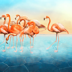 Compositing with a range of red flamingo at left side in the blue surreal desert with a sunset sky