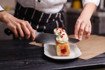 cutting cupcake filled with decorated