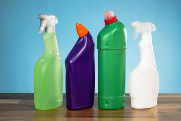 Cleaning products concept. Wooden floor