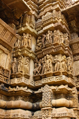Fototapeta na wymiar Close up of artful ancient carvings, Khajuraho Group of Monuments, India