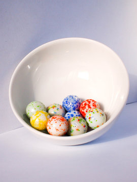 Colored balls in white piala
