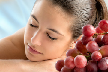 Woman relaxing at wine therapy.