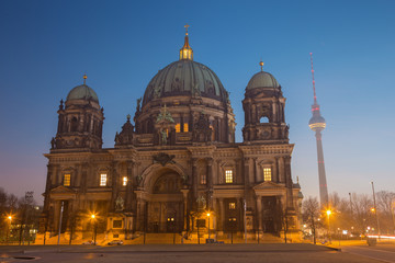 Fototapeta na wymiar Berlin - The Dom and the Fernsehturm in morning dusk.