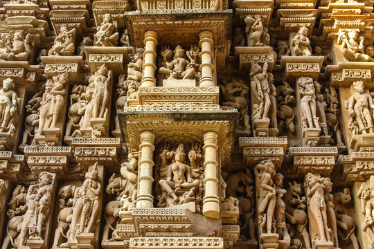 Close up of artful carved walls of Kandariya Mahadeva Temple, Khajuraho Group of Monuments, India
