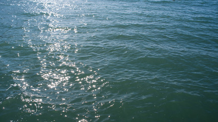 Water, sun glare on the water, reflections, sea background