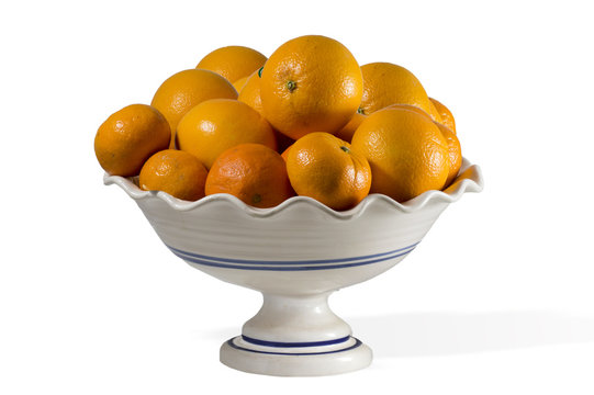 frutero con naranjas y mandarinas