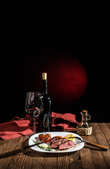 Beef steak with red wine of a rich dining table