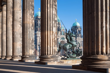 Berlin - The Dom, columns of Altes Museum and the bronze sculpture Lowenkampfer by Albert Wolff and...