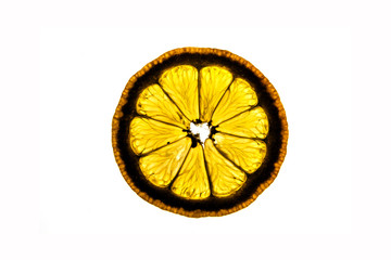 Sliced lemon on white backlight background