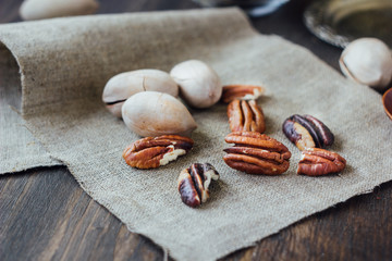 Fototapeta na wymiar Pecan nuts on cloth