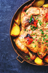 Baked chicken with potatoes