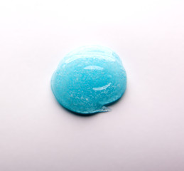 Smear cream isolated on white background. Cream texture.