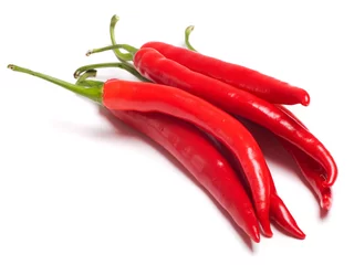 Fotobehang red hot chilli peppers isolated on white background © Alexstar