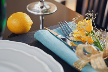 Table place setting with holidays decoration.