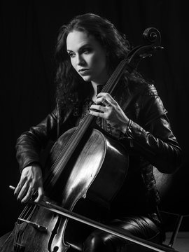 Gorgeous female playing the cello