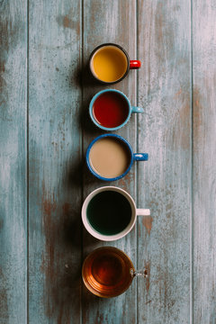 Different types of tea on a grunge blue wooden background