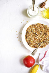 Healthy diet breakfast: granola,fruits,yogurt and honey.Top vie with space for text.