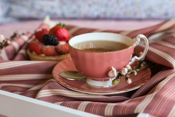Tea and cake beautiful and delicious breakfast concept.