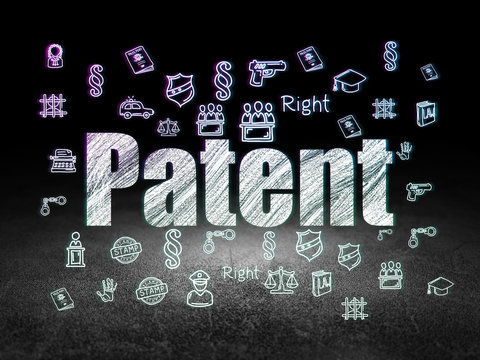 Law concept: Patent in grunge dark room