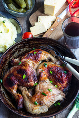 chicken legs  on cast iron pan