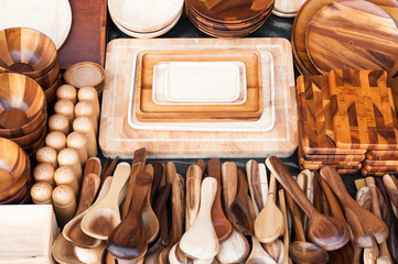 Wooden kitchen utensils at street market in thailand