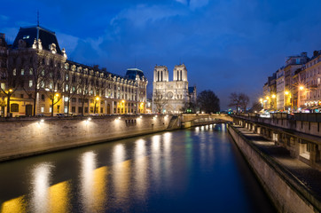 Notre-Dame de Paris and Seine river at blue hour