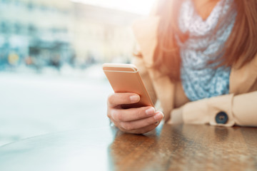 Young woman using smart phone