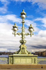 Fototapeta na wymiar Lantern on the Troitsky Bridge in St. Petersburg
