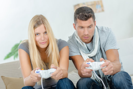 Couple playing computer game