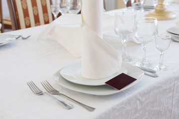 Interior of a cafe with the serviced tables