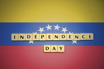letters with text independence day on the national flag of venezuela.