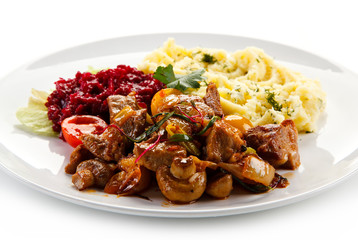 Goulash with mashed potatoes and vegetables 
