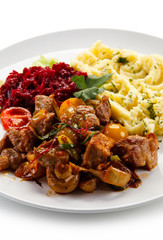 Goulash with mashed potatoes and vegetables 