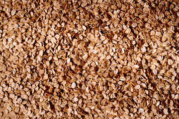 Food texture, oatmeal. Oat flakes. Oat ears, oat grain. Fresh and healthy breakfast. Nutritious meal.