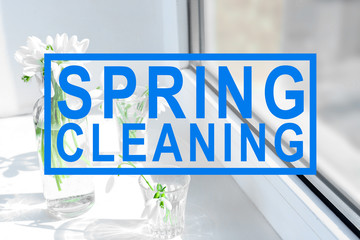 Beautiful bouquets of snowdrops in vases on windowsill